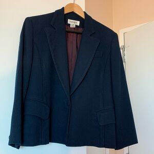 Navy blue jacket. 100% pure wool, fully lined.  size 8.